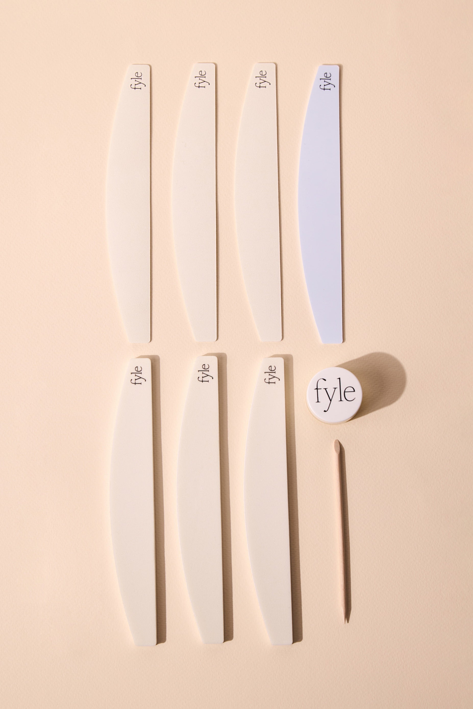 Fyle File Manicure tools laid out neatly on a neutral background.
