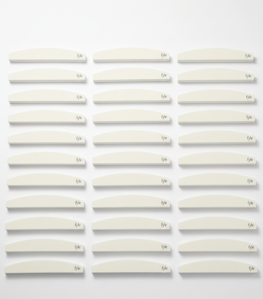 Nail buffer bundle with 54 professional buffers and complimentary cuticle sealing balm