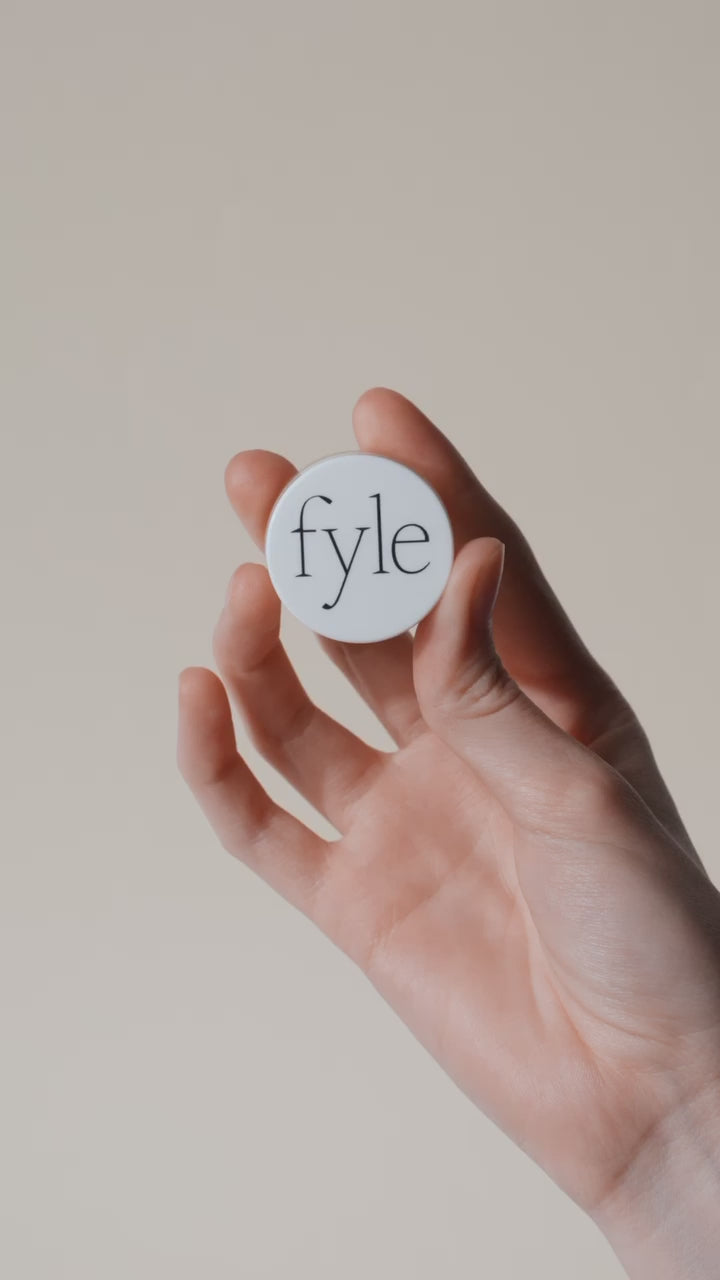  The Fyle File Manicure Kit with the Cuticle Sealing Balm, showing the full nail care set.
